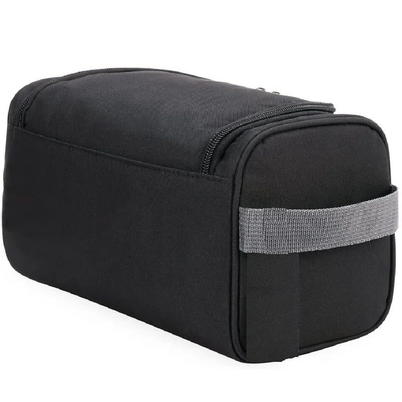Black toiletry bag with a gray strap on a white background
