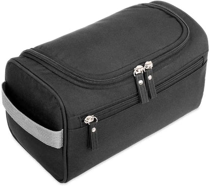Black toiletry bag with silver zippers on a white background
