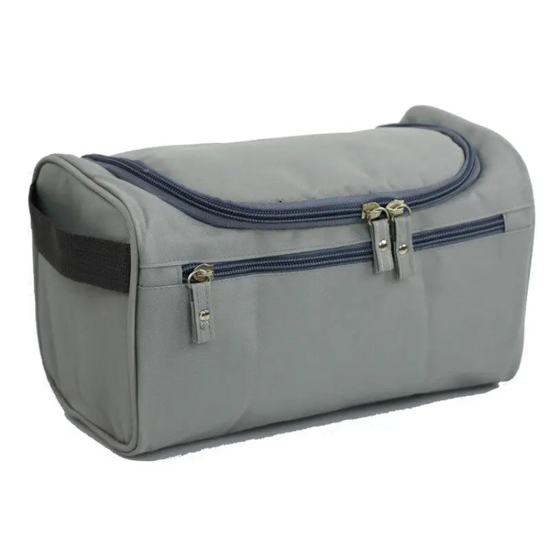 Gray toiletry bag with blue accents on a white background