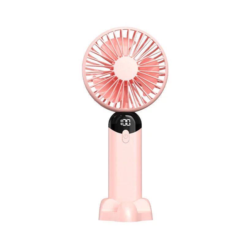 Pink handheld fan with digital display on a white background